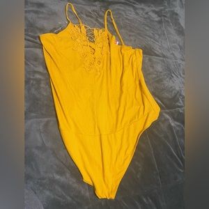 Yellow bodysuit